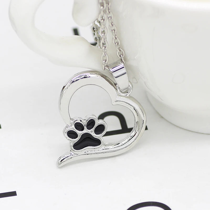 Lapful of Love — Enamel Paw Heart Pendant