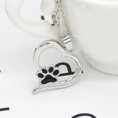 Lapful of Love — Enamel Paw Heart Pendant